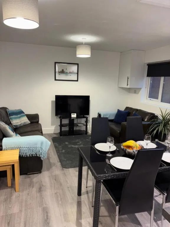 The open-plan living and dining area at Minster Apartment