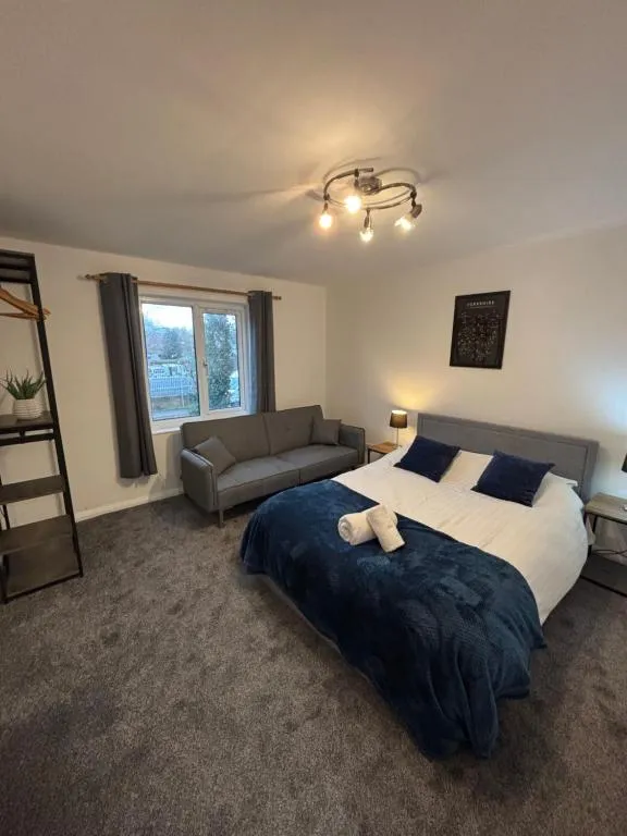 A bright double bedroom with fitted storage